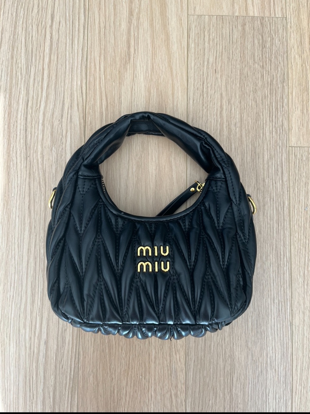 Black Quilted Mini Top-Handle Bag with Gold Logo